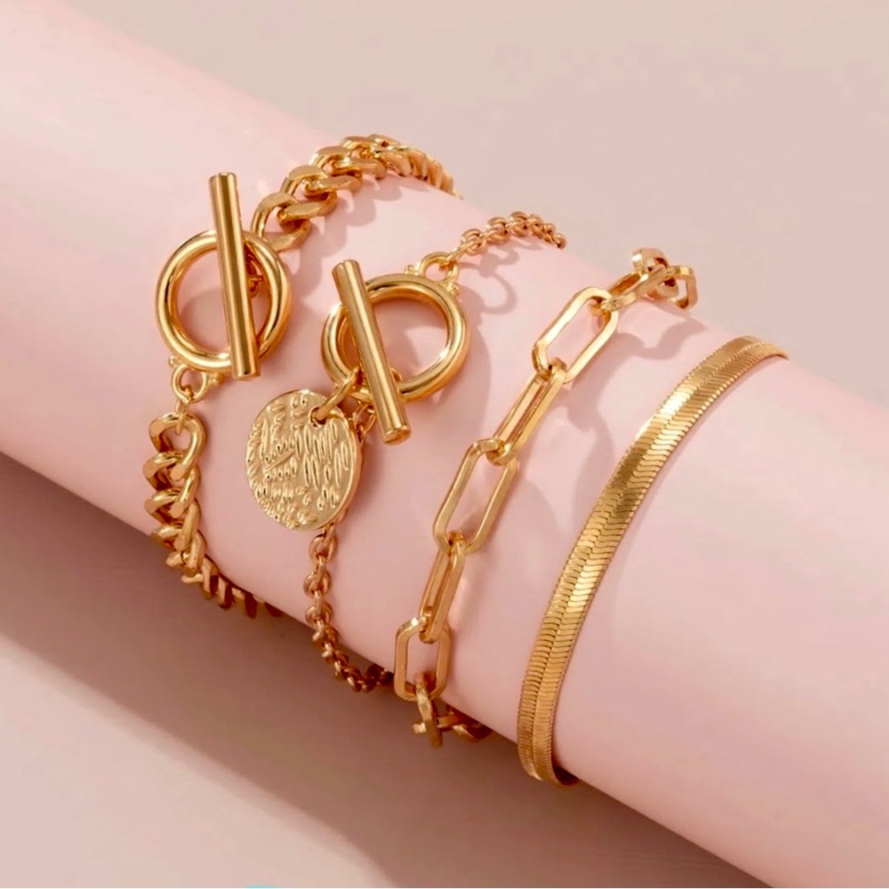 4 new bracelets gold tone